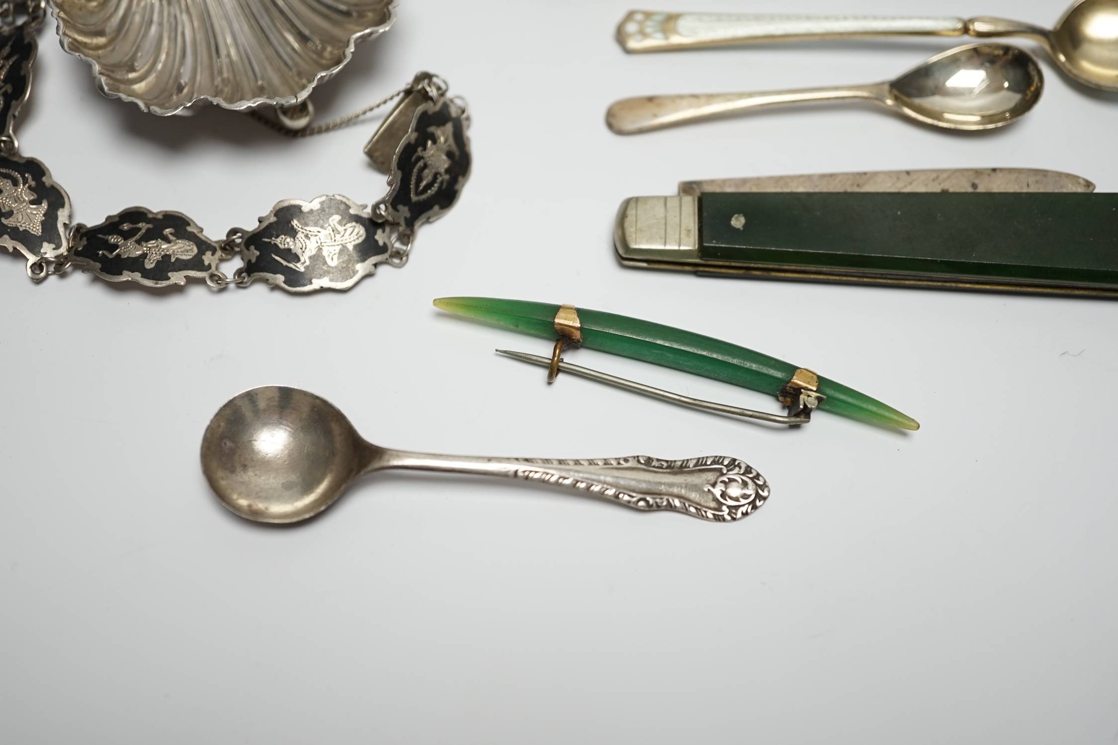 A late Victorian silver bun salt and other items including silver mounted pin cushion, silver shell salt, spoons etc.